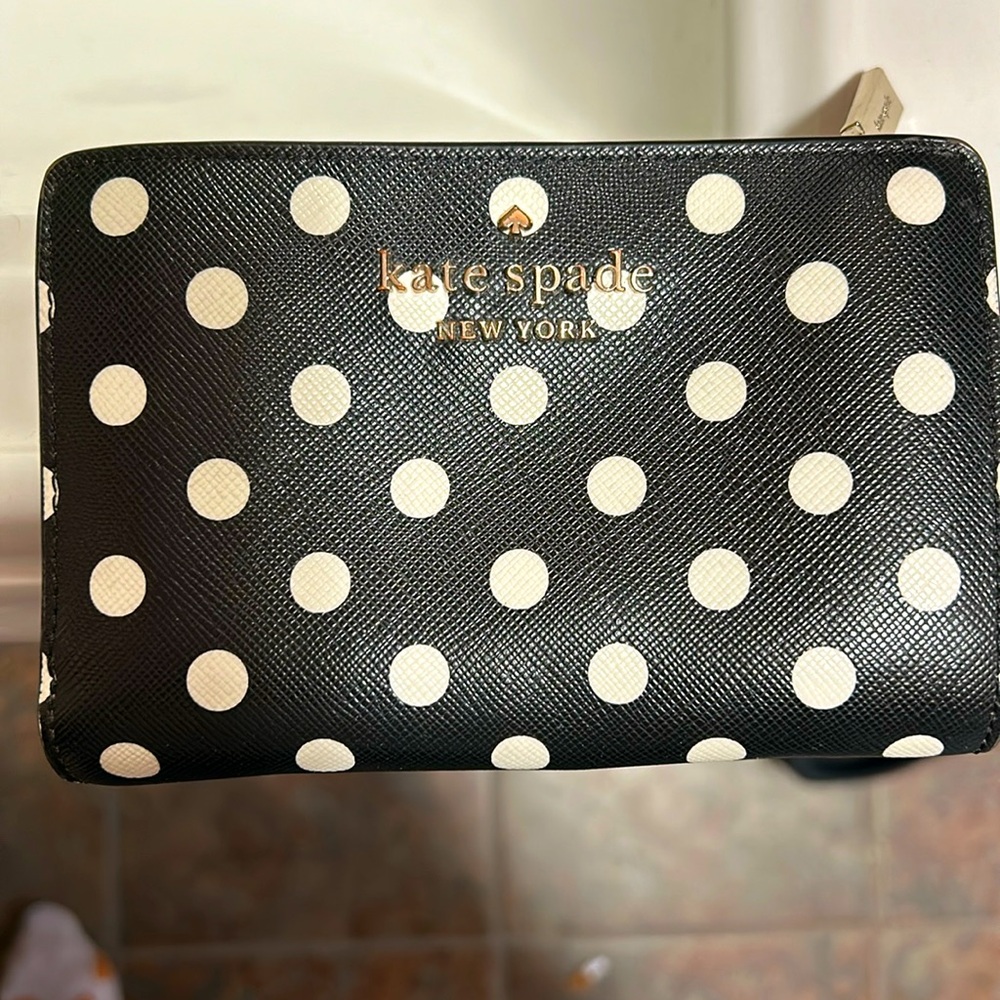 Kate Spade fold over wallet with zipper change purse. Black with ecru dots.